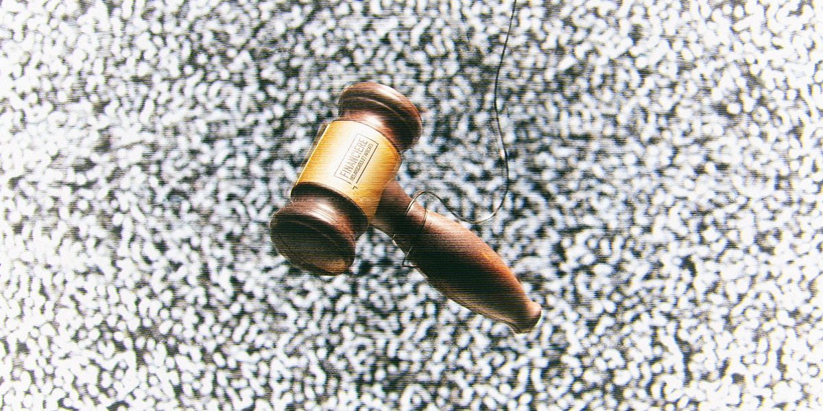 Gavel hanging from a string