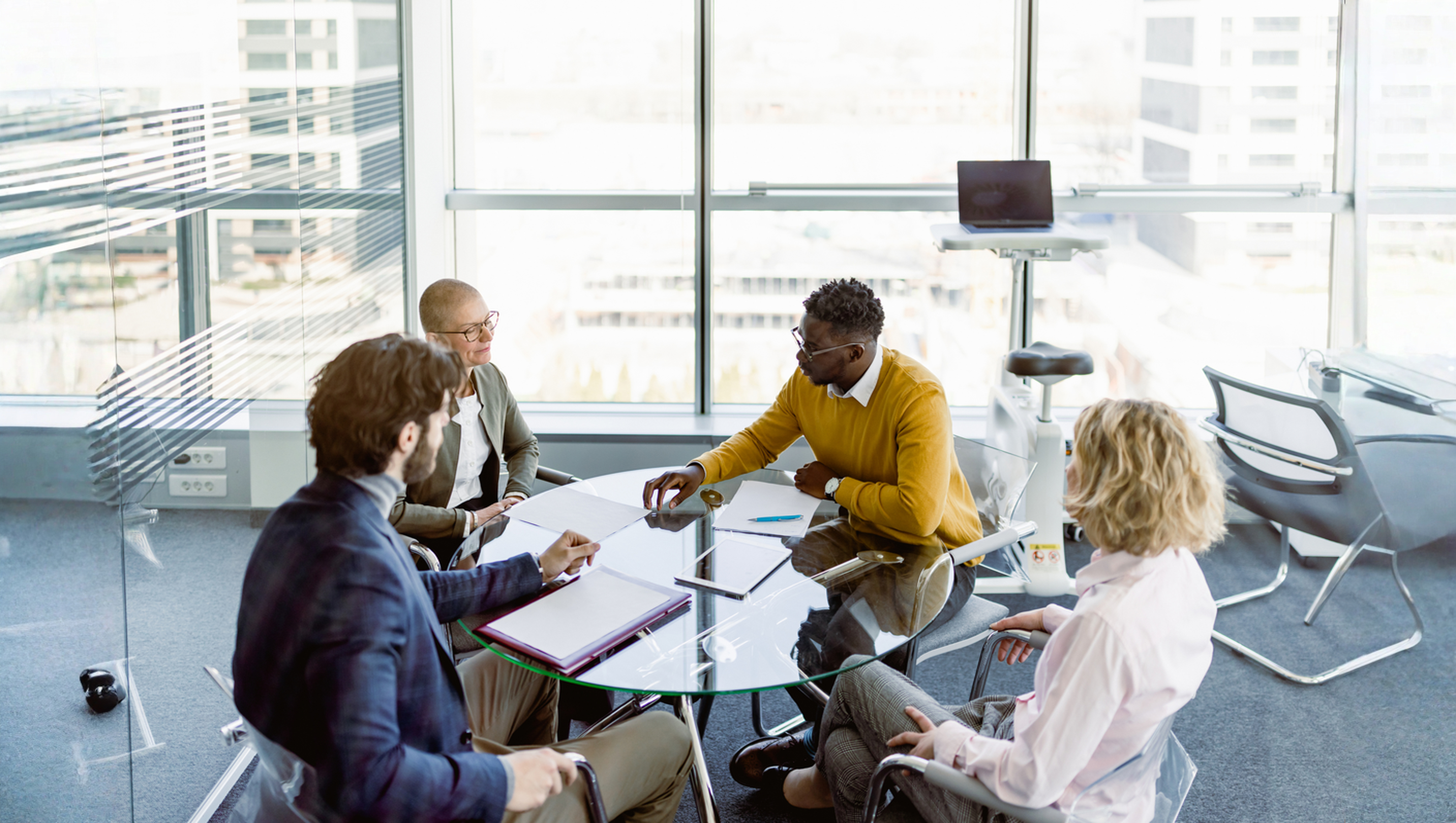 adults in a corporate meeting