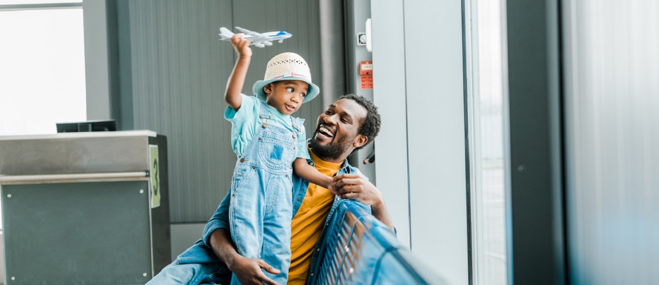 Man and son at the airport