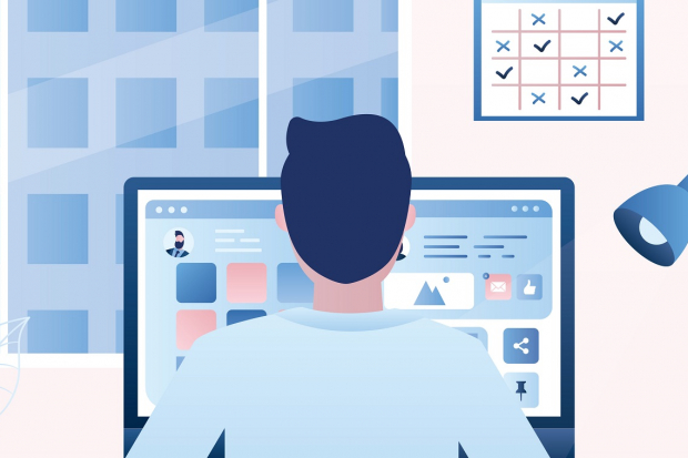 man in front of computer