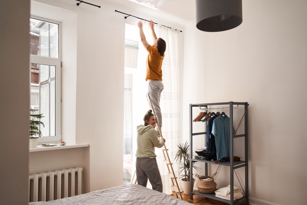 man and woman on a ladder, RRSP savings for Canadian lawyers